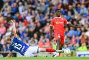 16 July 2025; Ben Hall of Linfield tackles Mipo Odubeko of Shelbourne, resulting in a red card, during the UEFA Champions League First Qualifying Round second leg match between Linfield and Shelbourne at Clearer Twist National Football Stadium at Windsor Park in Belfast. Photo by Stephen McCarthy/Sportsfile