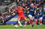 16 July 2025; Evan Caffrey of Shelbourne in action against Chris Shields of Linfield during the UEFA Champions League First Qualifying Round second leg match between Linfield and Shelbourne at Clearer Twist National Football Stadium at Windsor Park in Belfast. Photo by Stephen McCarthy/Sportsfile