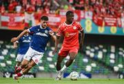 16 July 2025; Mipo Odubeko of Shelbourne in action against Euan East of Linfield during the UEFA Champions League First Qualifying Round second leg match between Linfield and Shelbourne at Clearer Twist National Football Stadium at Windsor Park in Belfast. Photo by Ben McShane/Sportsfile