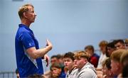 16 July 2025; Leinster Rugby head coach Leo Cullen with participants during a Q&A at the Leinster Rugby School of Excellence camp at The King's Hospital School in Dublin. Photo by Seb Daly/Sportsfile