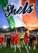 16 July 2025; Evan Caffrey of Shelbourne and teammates after their side's victory in the UEFA Champions League First Qualifying Round second leg match between Linfield and Shelbourne at Clearer Twist National Football Stadium at Windsor Park in Belfast. Photo by Stephen McCarthy/Sportsfile
