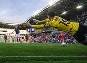 16 July 2025; Chris Shields of Shelbourne shoots to score his side's goal, from a penalty, past Shelbourne goalkeeper Lorcan Healy during the UEFA Champions League First Qualifying Round second leg match between Linfield and Shelbourne at Clearer Twist National Football Stadium at Windsor Park in Belfast. Photo by Stephen McCarthy/Sportsfile
