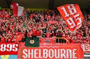 16 July 2025; Shelbourne supporters celebrate after the UEFA Champions League First Qualifying Round second leg match between Linfield and Shelbourne at Clearer Twist National Football Stadium at Windsor Park in Belfast. Photo by Stephen McCarthy/Sportsfile