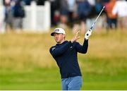 17 July 2025; Mackenzie Hughes of Canada watches his shot on the first hole during day one of The 153rd Open Championship at Royal Portrush Golf Club in Portrush, Antrim. Photo by Ramsey Cardy/Sportsfile