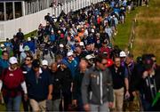 17 July 2025; Spectators arrive during day one of The 153rd Open Championship at Royal Portrush Golf Club in Portrush, Antrim. Photo by Ramsey Cardy/Sportsfile
