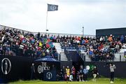 17 July 2025; Sam Burns of USA watches his tee shot on the first hole during day one of The 153rd Open Championship at Royal Portrush Golf Club in Portrush, Antrim. Photo by David Fitzgerald/Sportsfile