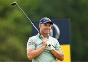 17 July 2025; Padraig Harrington of Ireland watches his tee shot on the 12th hole during day one of The 153rd Open Championship at Royal Portrush Golf Club in Portrush, Antrim. Photo by Ramsey Cardy/Sportsfile