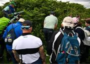 17 July 2025; Padraig Harrington of Ireland searches for his ball on the 11th hole during day one of The 153rd Open Championship at Royal Portrush Golf Club in Portrush, Antrim. Photo by Ramsey Cardy/Sportsfile