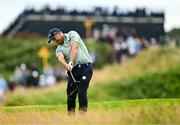 17 July 2025; Padraig Harrington of Ireland plays a shot from the rough on the 12th hole during day one of The 153rd Open Championship at Royal Portrush Golf Club in Portrush, Antrim. Photo by Ramsey Cardy/Sportsfile