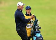 17 July 2025; Lee Westwood of England with his wife and caddie Helen Storey during day one of The 153rd Open Championship at Royal Portrush Golf Club in Portrush, Antrim. Photo by Ramsey Cardy/Sportsfile
