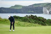 17 July 2025; Collin Morikawa of USA putts on the fifth green during day one of The 153rd Open Championship at Royal Portrush Golf Club in Portrush, Antrim. Photo by David Fitzgerald/Sportsfile
