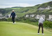 17 July 2025; Collin Morikawa of USA looks on as Scottie Scheffler of USA putts on the fifth green during day one of The 153rd Open Championship at Royal Portrush Golf Club in Portrush, Antrim. Photo by David Fitzgerald/Sportsfile