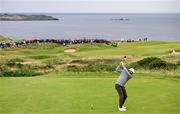 17 July 2025; Scottie Scheffler of USA plays his tee shot on the fifth hole during day one of The 153rd Open Championship at Royal Portrush Golf Club in Portrush, Antrim. Photo by Ramsey Cardy/Sportsfile
