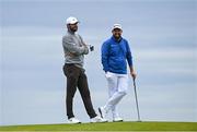 17 July 2025; Scottie Scheffler of USA and Shane Lowry of Ireland on the fifth green during day one of The 153rd Open Championship at Royal Portrush Golf Club in Portrush, Antrim. Photo by David Fitzgerald/Sportsfile