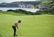 17 July 2025; Xander Schauffele of USA putts on the fifth green during day one of The 153rd Open Championship at Royal Portrush Golf Club in Portrush, Antrim. Photo by David Fitzgerald/Sportsfile