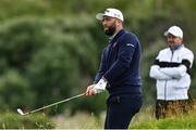 17 July 2025; Jon Rahm of Spain watches his shot on the fifth hole during day one of The 153rd Open Championship at Royal Portrush Golf Club in Portrush, Antrim. Photo by David Fitzgerald/Sportsfile