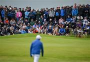 17 July 2025; Spectators look on as Shane Lowry of Ireland walks to the sixth green during day one of The 153rd Open Championship at Royal Portrush Golf Club in Portrush, Antrim. Photo by David Fitzgerald/Sportsfile