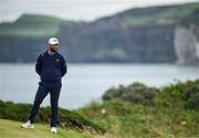 17 July 2025; Jon Rahm of Spain waits by the fifth green during day one of The 153rd Open Championship at Royal Portrush Golf Club in Portrush, Antrim. Photo by David Fitzgerald/Sportsfile