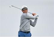 17 July 2025; Ben Griffin of USA watches his tee shot on the fifth hole during day one of The 153rd Open Championship at Royal Portrush Golf Club in Portrush, Antrim. Photo by David Fitzgerald/Sportsfile