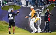 17 July 2025; Haotong Li of China on the 18th green during day one of The 153rd Open Championship at Royal Portrush Golf Club in Portrush, Antrim. Photo by Ramsey Cardy/Sportsfile