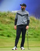 17 July 2025; Dustin Johnson of USA after putting on the 18th green during day one of The 153rd Open Championship at Royal Portrush Golf Club in Portrush, Antrim. Photo by Ramsey Cardy/Sportsfile