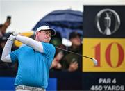 17 July 2025; Robert MacIntyre of Scotland watches his tee shot on the 10th hole during day one of The 153rd Open Championship at Royal Portrush Golf Club in Portrush, Antrim. Photo by David Fitzgerald/Sportsfile