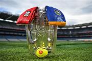 18 July 2025; The Liam MacCarthy Cup is pictured at Croke Park in Dublin alongside an official match sliotar and the jerseys of Cork and Tipperary ahead of the GAA Hurling All-Ireland Senior Championship Final between Cork and Tipperary. Photo by Sam Barnes/Sportsfile