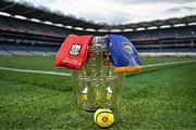 18 July 2025; The Liam MacCarthy Cup is pictured at Croke Park in Dublin alongside an official match sliotar and the jerseys of Cork and Tipperary ahead of the GAA Hurling All-Ireland Senior Championship Final between Cork and Tipperary. Photo by Sam Barnes/Sportsfile