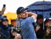 17 July 2025; Justin Rose of England watches his tee shot on the 10th hole during day one of The 153rd Open Championship at Royal Portrush Golf Club in Portrush, Antrim. Photo by David Fitzgerald/Sportsfile