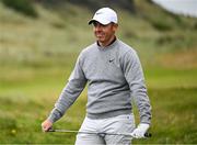 17 July 2025; Rory McIlroy of Northern Ireland reacts to his from from the rough on the seventh hole during day one of The 153rd Open Championship at Royal Portrush Golf Club in Portrush, Antrim. Photo by Ramsey Cardy/Sportsfile