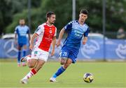17 July 2025; Zach Elbouzedi of St Patrick's Athletic in action against Lazar Kojic of FC Hegelmann during the UEFA Conference League First Qualifying Round second leg match between FC Hegelmann and St Patrick's Athletic at Raudondvaris Stadium in Raudondvaris, Lithuania. Photo by Evaldas Semiotas/Sportsfile