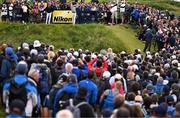 17 July 2025; A general view as Rory McIlroy of Northern Ireland watches his tee shot on the 14th hole during day one of The 153rd Open Championship at Royal Portrush Golf Club in Portrush, Antrim. Photo by Ramsey Cardy/Sportsfile