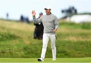 17 July 2025; Rory McIlroy of Northern Ireland acknowledges the crowd as he walks up the 18th fairway during day one of The 153rd Open Championship at Royal Portrush Golf Club in Portrush, Antrim. Photo by Ramsey Cardy/Sportsfile