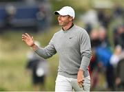 17 July 2025; Rory McIlroy of Northern Ireland acknowledges the crowd as he walks up the 18th fairway during day one of The 153rd Open Championship at Royal Portrush Golf Club in Portrush, Antrim. Photo by Ramsey Cardy/Sportsfile
