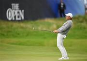 17 July 2025; Rory McIlroy of Northern Ireland reacts to a missed putt on the 18th green during day one of The 153rd Open Championship at Royal Portrush Golf Club in Portrush, Antrim. Photo by Ramsey Cardy/Sportsfile