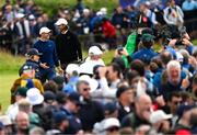 18 July 2025; Rory McIlroy of Northern Ireland and Tommy Fleetwood of England with supporters during day two of The 153rd Open Championship at Royal Portrush Golf Club in Portrush, Antrim. Photo by Ramsey Cardy/Sportsfile