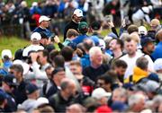 18 July 2025; Rory McIlroy of Northern Ireland and Tommy Fleetwood of England with supporters during day two of The 153rd Open Championship at Royal Portrush Golf Club in Portrush, Antrim. Photo by Ramsey Cardy/Sportsfile