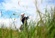 18 July 2025; Rory McIlroy of Northern Ireland plays a shot from the rough on the second hole during day two of The 153rd Open Championship at Royal Portrush Golf Club in Portrush, Antrim. Photo by David Fitzgerald/Sportsfile