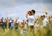 18 July 2025; Brian Harman of USA watches his tee shot on the ninth hole during day two of The 153rd Open Championship at Royal Portrush Golf Club in Portrush, Antrim. Photo by Ramsey Cardy/Sportsfile
