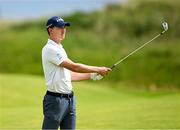 18 July 2025; Maverick McNealy of USA watches his shot on the ninth hole during day two of The 153rd Open Championship at Royal Portrush Golf Club in Portrush, Antrim. Photo by Ramsey Cardy/Sportsfile