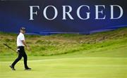 18 July 2025; Brian Harman of USA walks onto the ninth green during day two of The 153rd Open Championship at Royal Portrush Golf Club in Portrush, Antrim. Photo by Ramsey Cardy/Sportsfile