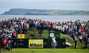 18 July 2025; Justin Thomas of USA watches his tee shot on the ninth hole during day two of The 153rd Open Championship at Royal Portrush Golf Club in Portrush, Antrim. Photo by David Fitzgerald/Sportsfile