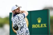 18 July 2025; Tyrrell Hatton of England watches his tee shot on the 12th hole during day two of The 153rd Open Championship at Royal Portrush Golf Club in Portrush, Antrim. Photo by Ramsey Cardy/Sportsfile