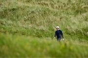 18 July 2025; Rory McIlroy of Northern Ireland walks on the seventh hole during day two of The 153rd Open Championship at Royal Portrush Golf Club in Portrush, Antrim. Photo by David Fitzgerald/Sportsfile