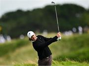 18 July 2025; Tommy Fleetwood of England plays a shot from the rough on the 12th hole during day two of The 153rd Open Championship at Royal Portrush Golf Club in Portrush, Antrim. Photo by David Fitzgerald/Sportsfile