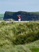 18 July 2025; KJ Choi of South Korea watches his tee shot on the sixth hole during day two of The 153rd Open Championship at Royal Portrush Golf Club in Portrush, Antrim. Photo by Ramsey Cardy/Sportsfile