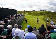 18 July 2025; Brian Harman of USA watches his tee shot on the 16th hole during day two of The 153rd Open Championship at Royal Portrush Golf Club in Portrush, Antrim. Photo by Ramsey Cardy/Sportsfile