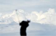 18 July 2025; Clouds are seen as Rory McIlroy of Northern Ireland watches his shot on the 15th hole during day two of The 153rd Open Championship at Royal Portrush Golf Club in Portrush, Antrim. Photo by David Fitzgerald/Sportsfile