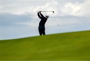 18 July 2025; Rory McIlroy of Northern Ireland watches his shot from the 15th fairway during day two of The 153rd Open Championship at Royal Portrush Golf Club in Portrush, Antrim. Photo by David Fitzgerald/Sportsfile