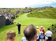 18 July 2025; Rory McIlroy of Northern Ireland watches his tee shot on the 16th hole during day two of The 153rd Open Championship at Royal Portrush Golf Club in Portrush, Antrim. Photo by David Fitzgerald/Sportsfile